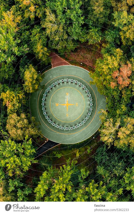 Aerial drone view of Rose of Wind sign in city park four winds rose of wind cardinal direction wind rose star symbol compass point cardinal point aerial emblem