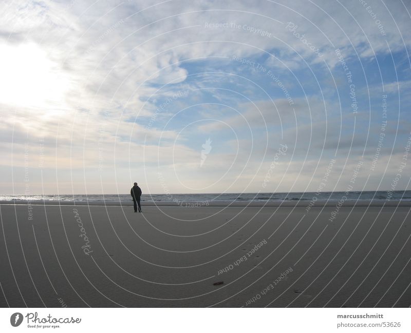Man on the beach Beach Ocean Loneliness Calm Clouds Amrum Sky Sand Water Island