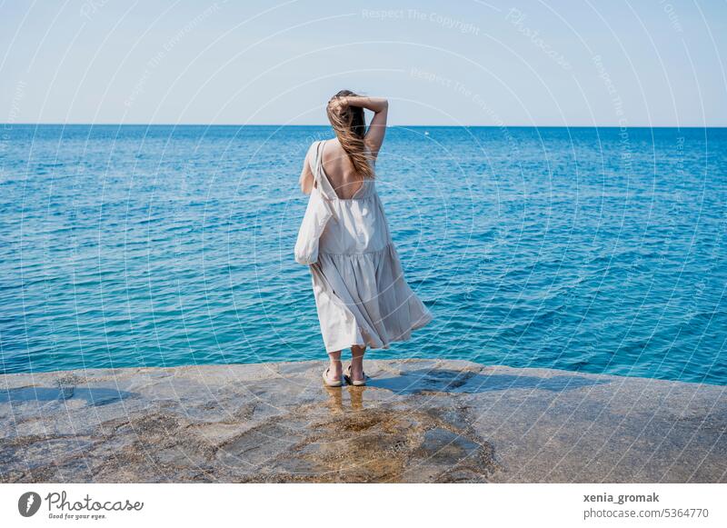 Young woman at the sea vacation Vacation & Travel Ocean Relaxation Summer Beach Tourism coast Water Vacation mood Walk on the beach Vacation photo