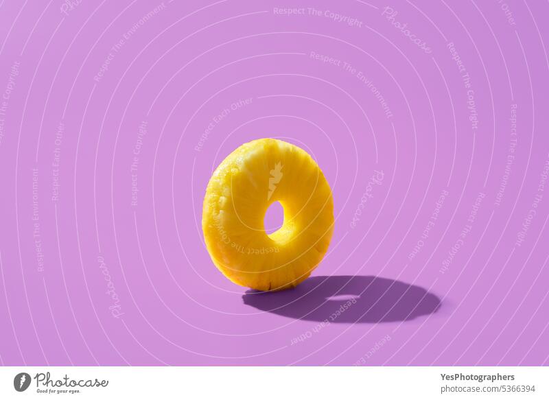 Pineapple ring minimalist on a purple background ananas bright circle close-up color cross section cuisine cut out delicious dessert diet food fresh fruit