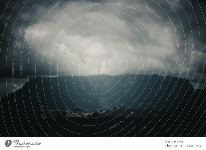 Thick clouds over the mountains and the country Cloud cover Clouds in the sky Deserted Cloud field Sky Bank of clouds Environment Climate Exterior shot Nature