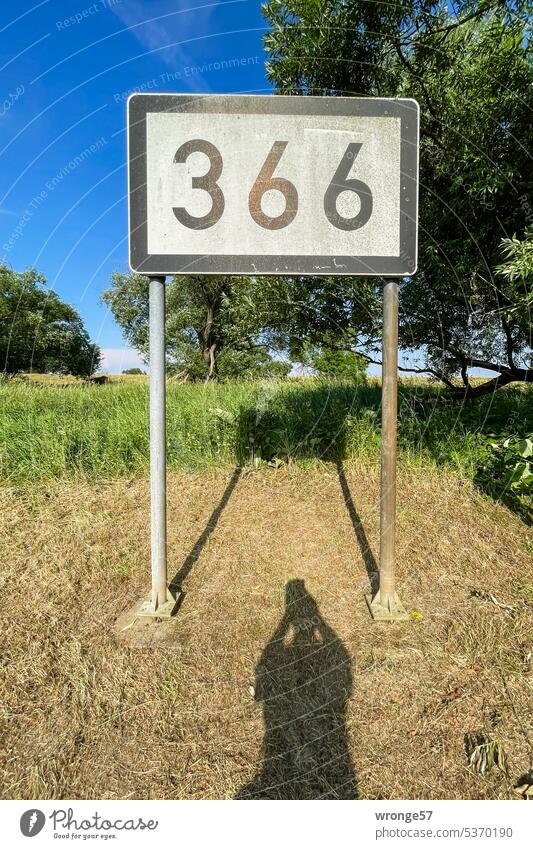 Kilometer marker 366 on the banks of the Elbe Elbe kilometer mileage distance specification Signs and labeling Elbufer Exterior shot Colour photo Deserted