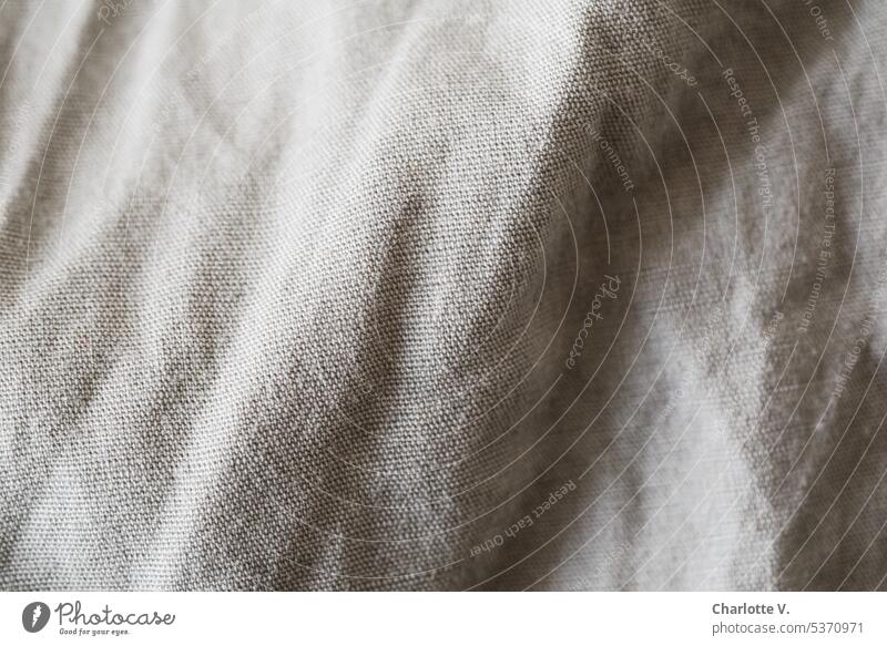 Gray in gray | gray fabric close up Cloth crease Folds Light Shadow Light and shadow structures textile Cotton plant woven fabric Woven Detail grey in grey