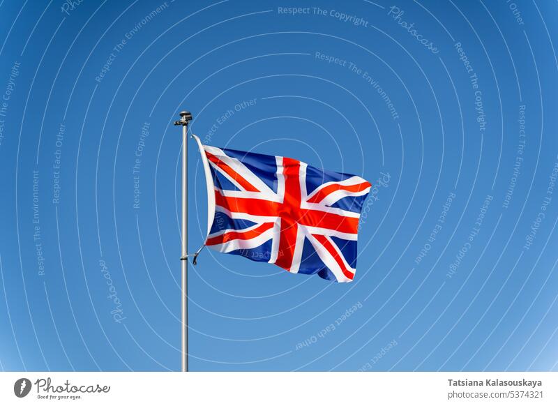 Union Jack Flag of Great Britain against a Blue Sky British Flag England English Flag UK National Flag English Culture Flying Pole national british symbol