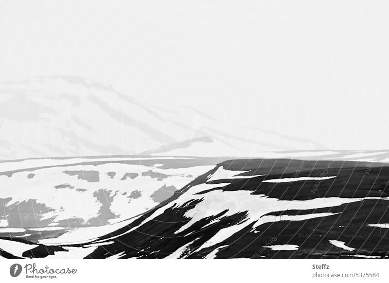Mountains and hills on mountain pass Fjardarheidi in Iceland East Iceland Fog somber Lonely Gray foggy Cold Snow Loneliness Hill residual snow Landforms Rock