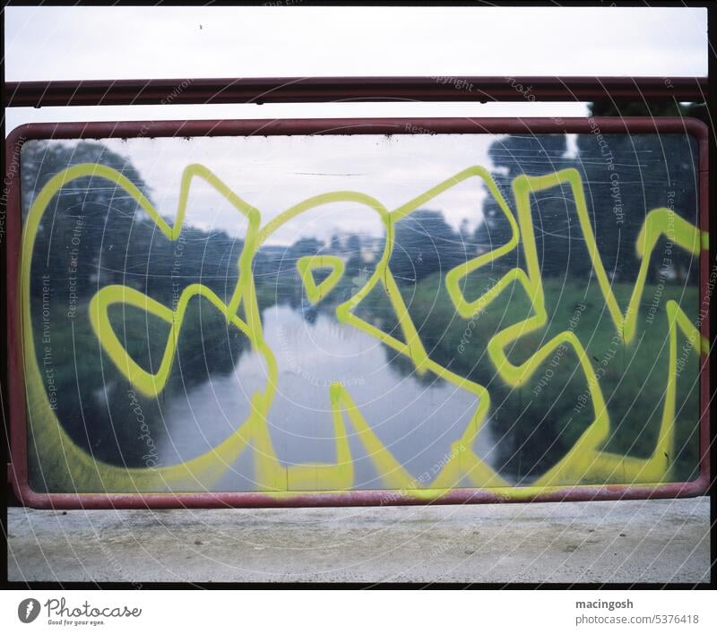 Graffito on a glass pane Pane Bridge railing Pedestrian crossing Deserted Exterior shot Manmade structures Colour photo Traffic infrastructure Lanes & trails