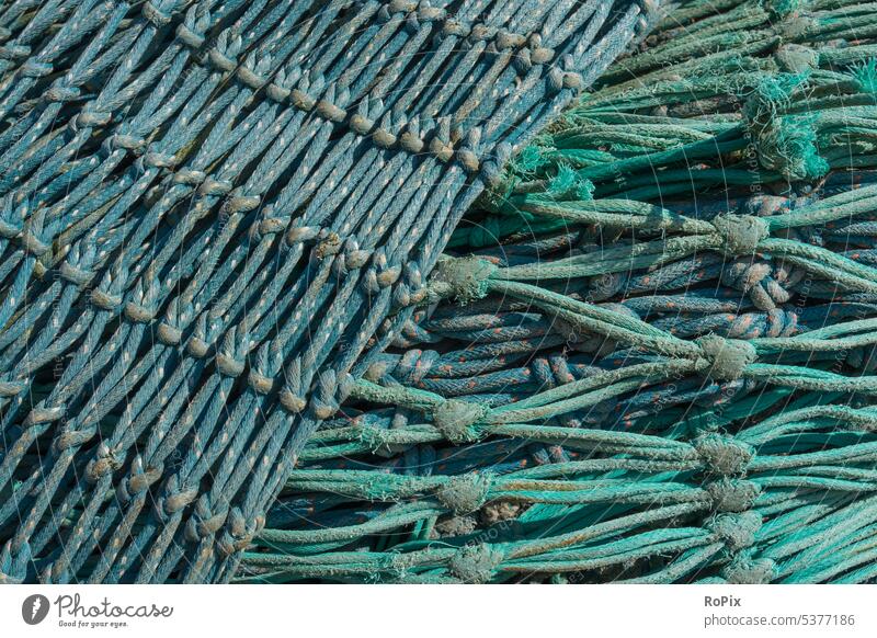 Large Rope Fish Net In A Pile Stock Photo, Picture and Royalty