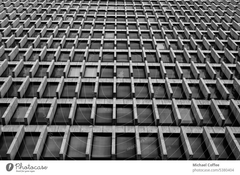 side profile of a large building with windows and walls Architecture Perspective Window architecture urban glass exterior metropolitan Atlanta black and white