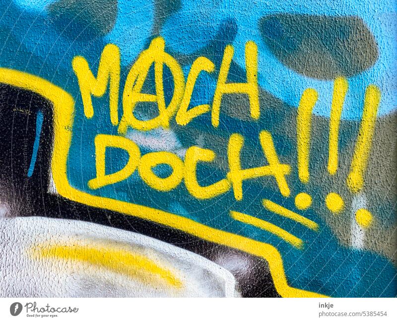 Graffiti lettering Do it! Deserted Colour photo Anarchy Exterior shot Yellow Blue Actionism communication Characters Wall (building) Sign Wall (barrier) Facade