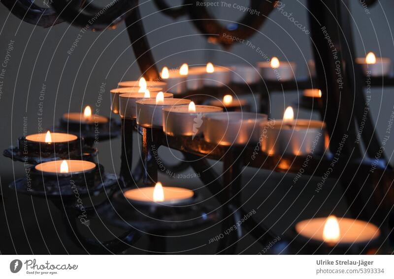Candlelight in a church Light shoulder stand candlelight Church Hope Belief Tea lights Flame Fireglow Candle holder Candle flame Illuminate Burn Pensive