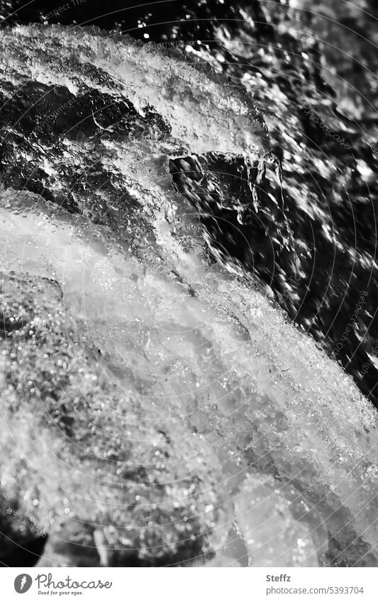 Waterfall neckline with icy water on Iceland East Iceland waterfall neckline Frost icily chill Cold Iceland weather primal power Water cascade hydropower