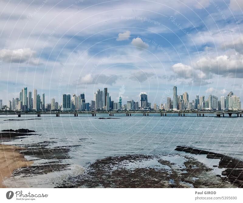 Panama City skyscrapers view from the old district of Casco Viejo city skyscrapers casco viejo panama city landscape sea building cloud bridge skyline scening