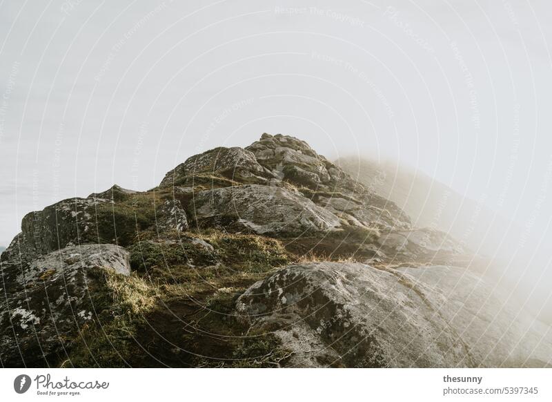 Fog in the mountain Haukland Beach foggy mountains Hiking hike Misty atmosphere Shroud of fog Mountain Mountain landscapes Norway