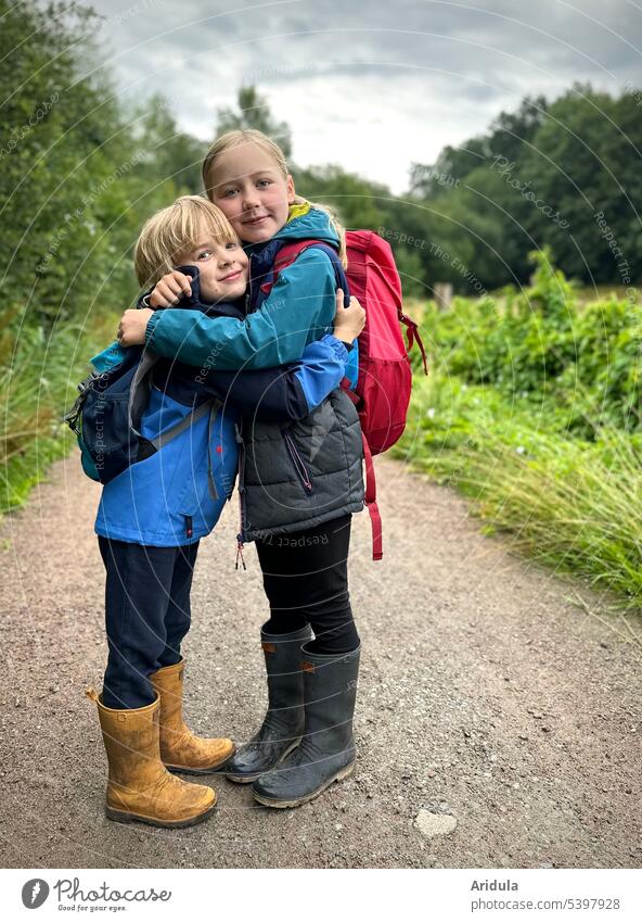 Permanent | a hug Brothers and sisters Infancy children Boy (child) Girl Child Love brotherly love Friendship Smiling Like affectionately Nature out Hiking hike