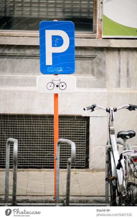 Parking space for bicycles Bicycle lot sign Bicycle rack Parking lot Town downtown switch off Means of transport Sign