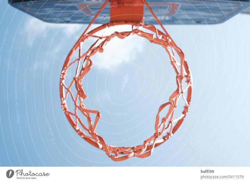 orange basketball hoop from below against blue summer sky Basketball basket Worm's-eye view Basketball arena Ball sports Sky Sporting Complex Deserted