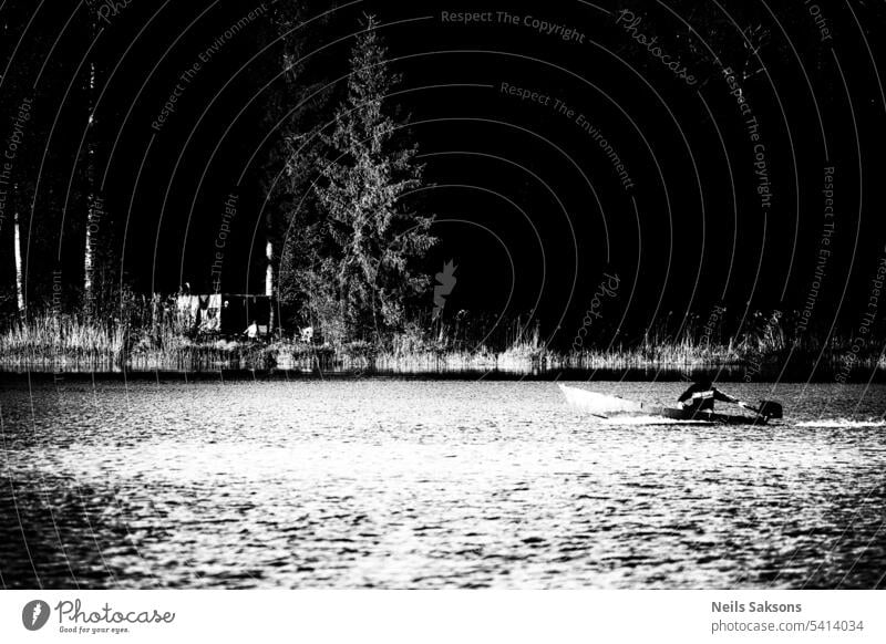 Black and white photo of a boat on a lake in evening background beautiful black black and white blue fishing forest grass landscape nature ocean old outdoor