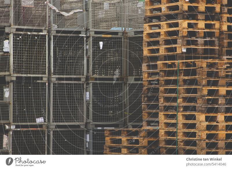 stacked pallets and metal mesh boxes Palett pallet stacks Wooden pallets Metal mesh boxes Box pallets Industry Empty Delivery Shipping Storage Stack logistics