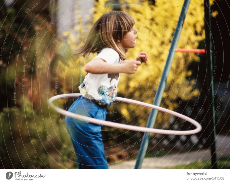young girl with hula hoop Playing Fitness Sports Training Girl 1 Human being 8 - 13 years Child Infancy Bangs Tire Rotate Growth Thin Happiness Healthy