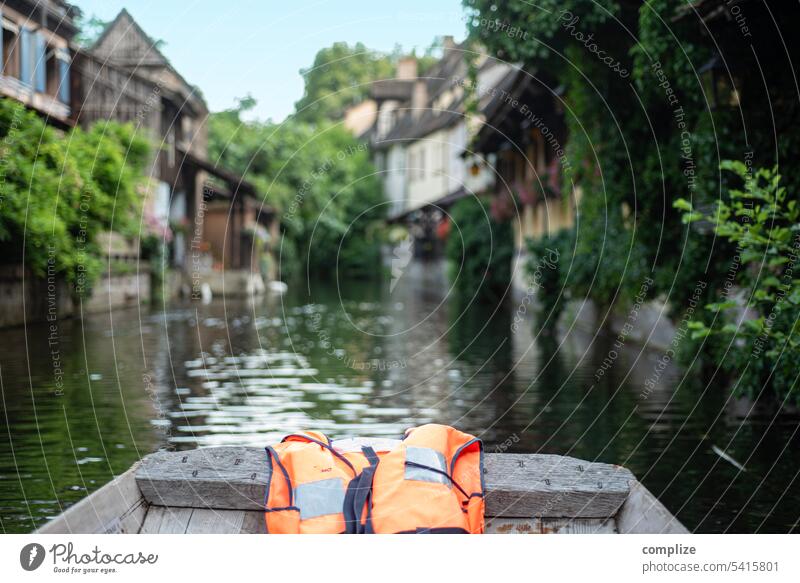 On the river Lauch through Colmar River Idyll Water Life jacket Channel Little Venice Boating trip Navigation go boating be afloat leek drift tranquillity