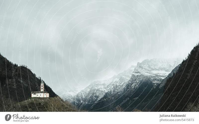 Chapel in beautiful alpine panorama in Switzerland Day Sky Alps Environment Freedom Tourism Panorama (View) Peak Mountain Landscape Nature Colour photo