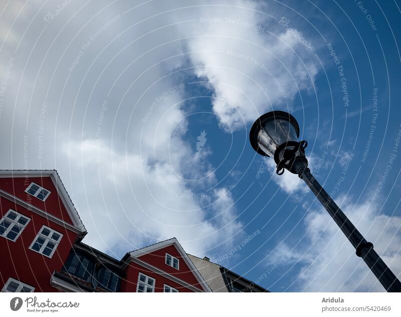 Nyhavn Copenhagen | house and street lamp against blue sky with white clouds Harbour Denmark Vacation & Travel Tourism Town row of houses variegated Facade