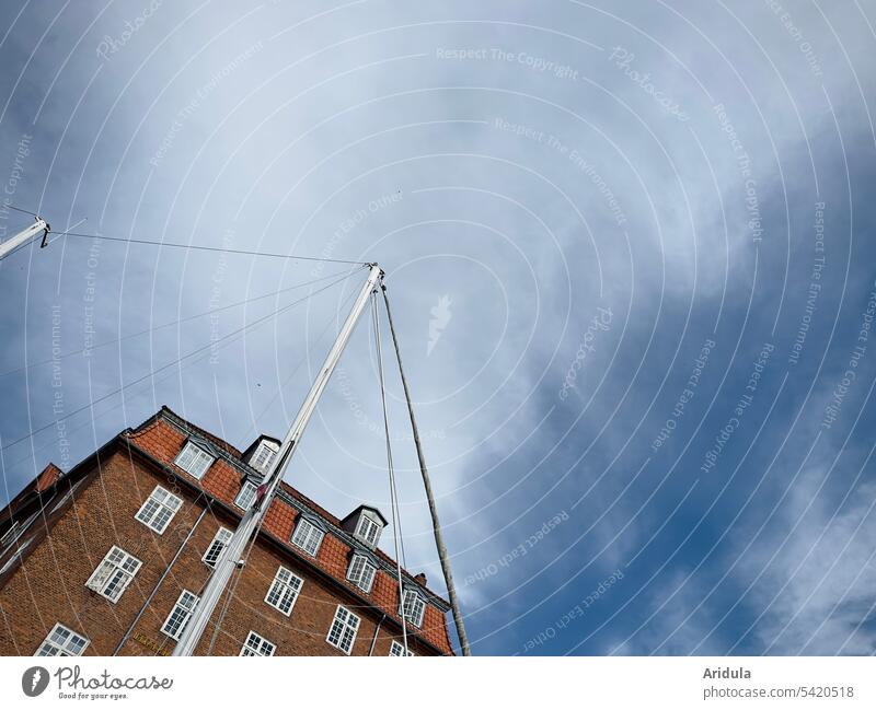 Ship mast and house leaning against cloudy sky slanting House (Residential Structure) Pole ship's mast Harbour Old building Sky Navigation Sailboat Clouds