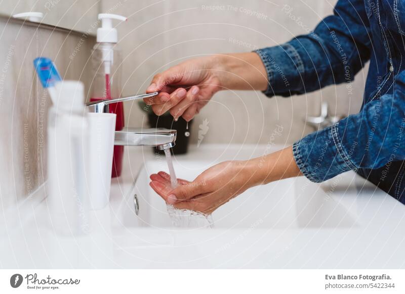 unrecognizable woman washing hands on a sink with soap. Coronavirus covid-19 concept corona virus stay home alcohol hygiene personal sanitary life water female