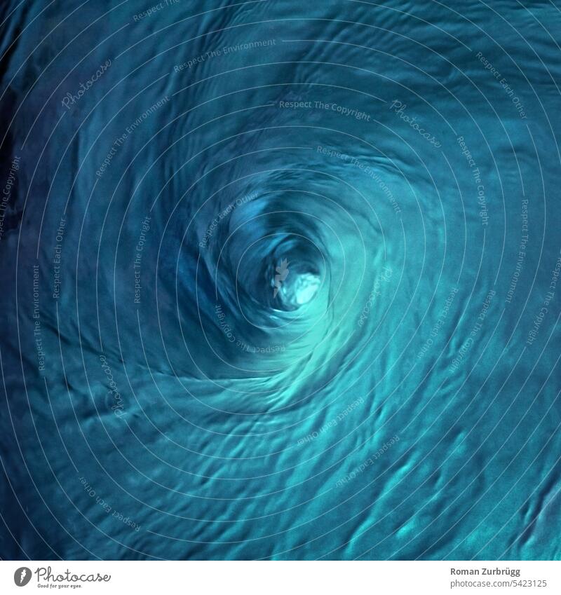 https://www.photocase.com/photos/5423125-wicked-how-this-water-vortex-sucks-everything-in-photocase-stock-photo-large.jpeg