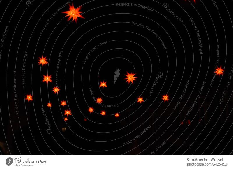 glowing red stars floating in the night sky | patchy Star (Symbol) Lighting Christmas & Advent lordnhut stars Atmosphere Christmas mood light darkness