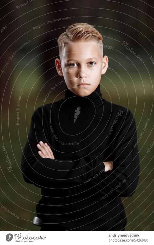 young man with modern hairstyle - a Royalty Free Stock Photo from Photocase