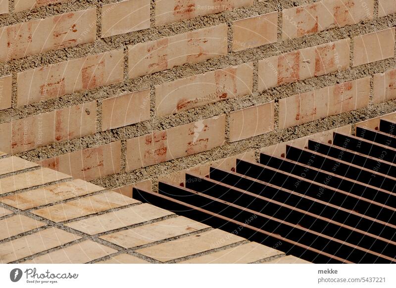 Geometry in masonry Wall (barrier) brick bricks Metal grid Hollow Wall (building) Grating Facade Architecture Iron Structures and shapes New unplastered