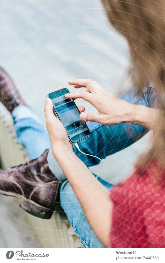 Close-up of man using cell phone mobile phone mobiles mobile phones Cellphone cell phones men males telephones communication telecommunication Adults grown-ups