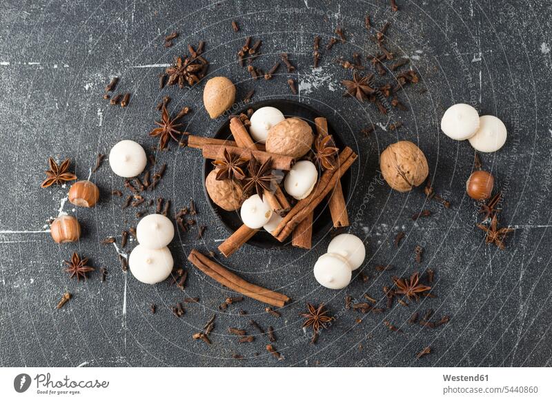 Spices, nuts and aniseed biscuit on grey ground food and drink Nutrition Alimentation Food and Drinks traditional culture aniseed biscuits still life