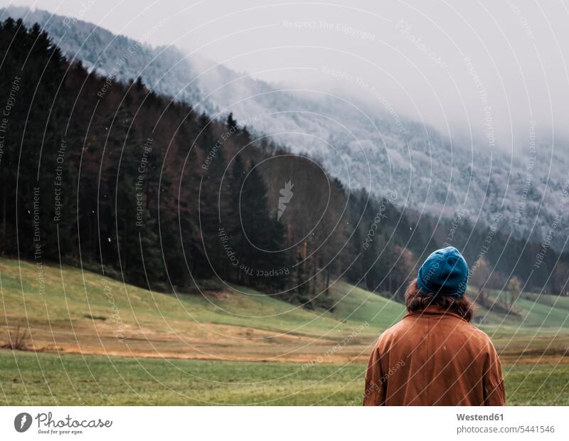 Austria, Mondsee, back view of young man men males Adults grown-ups grownups adult people persons human being humans human beings watching looking looking at