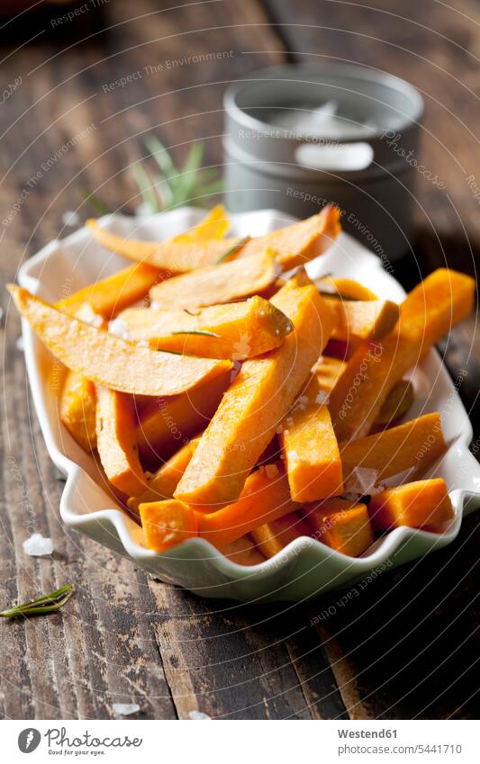 Sweet potato fries with rosmary and salt in porcelain bowl food and drink Nutrition Alimentation Food and Drinks fast food fastfood deep-fried deep fried