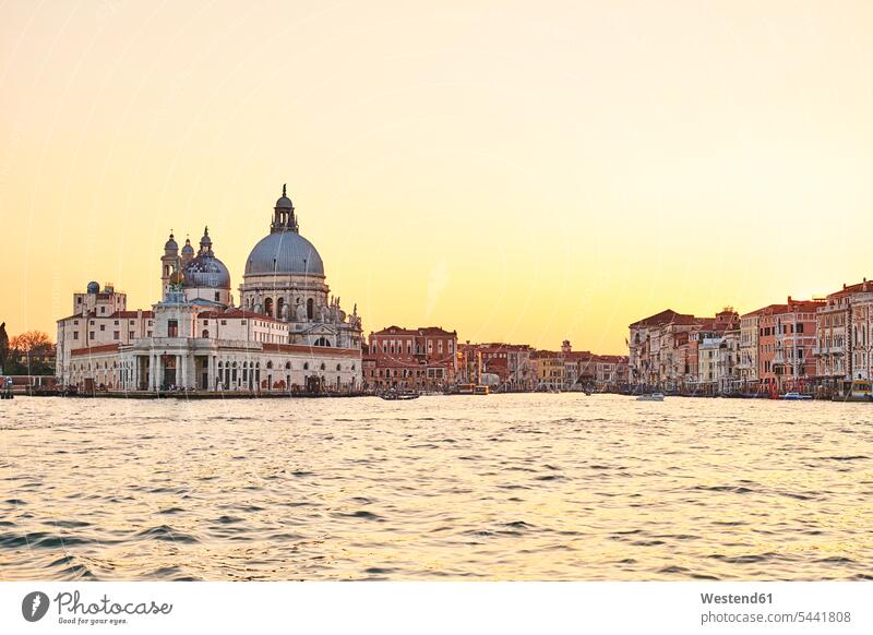 Italy, Venice, Silhouette of Santa Maria della Salute at sunrise morning in the morning Golden Hour copy space canal dawn atmosphere atmospheric