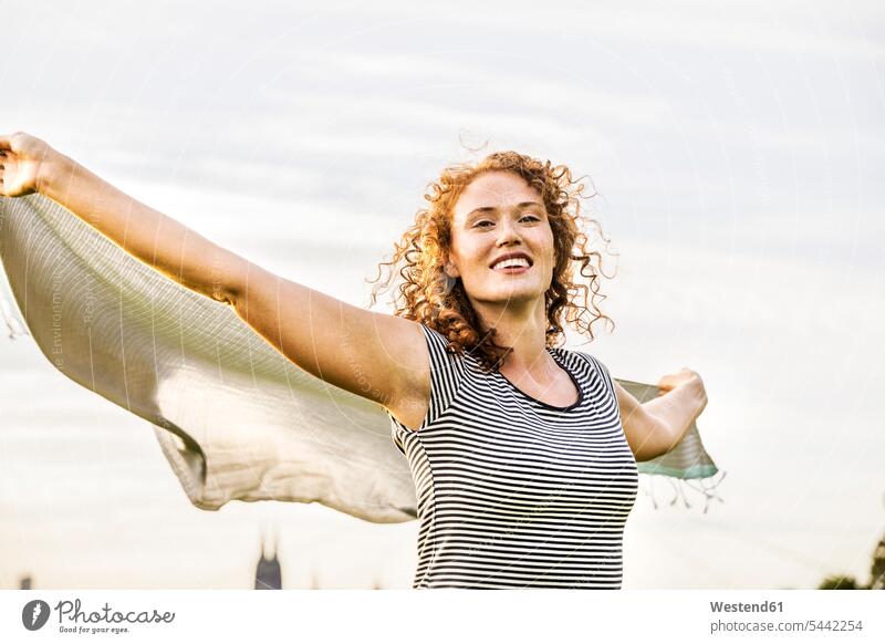 Germany, Cologne, portrait of happy young woman portraits females women Adults grown-ups grownups adult people persons human being humans human beings cloth