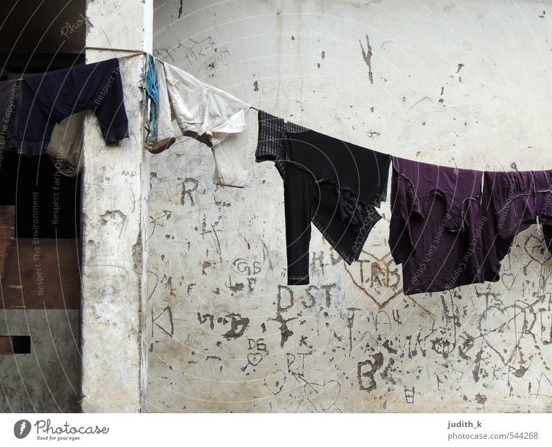 laundry day Washhouse India Village Hut Wall (barrier) Wall (building) Clothing T-shirt Pants Sweater Poverty Dirty Wet Clean Gloomy Gray White Cleanliness Calm