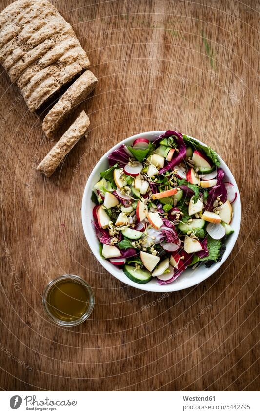 Mixed salad and bread food and drink Nutrition Alimentation Food and Drinks mixed salad Radicchio Radicchio Salad lettuce jar jars sprouts pieces dressing