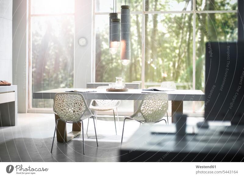 Interior of a modern office with nature view nobody meeting table meeting tables chair chairs design Designs furnishing Furnishings office equipment