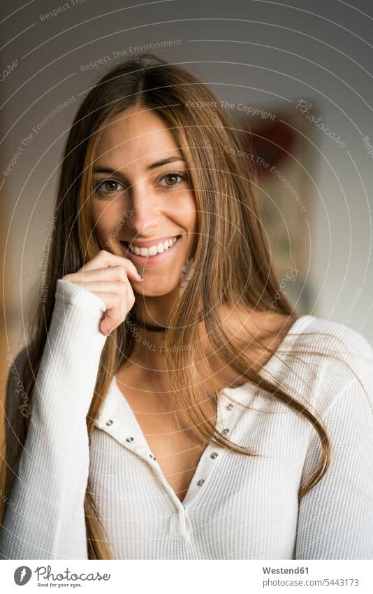 Portrait of smiling young woman smile portrait portraits females women Adults grown-ups grownups adult people persons human being humans human beings home
