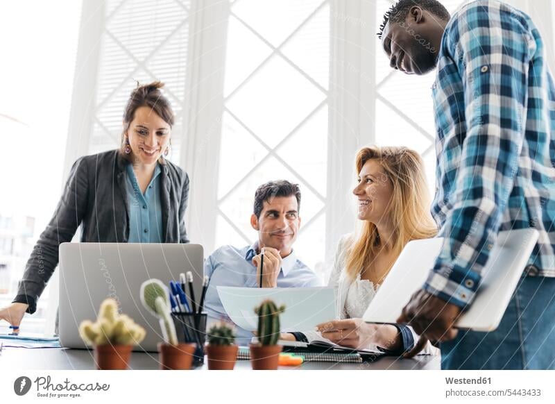 Young team working having a meeting in office At Work creative professional Creative People creatives Creative Occupation creative professionals