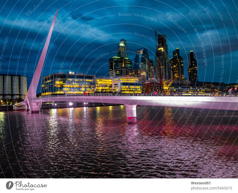 Argentina, Buenos Aires, Puerto Madero, Dock Sud with Puente de la Mujer at night illuminated lit lighted Illuminating illumination lighting outdoors