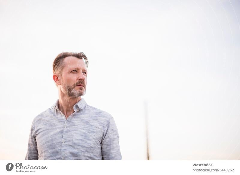 Portrait of mature man looking at distance portrait portraits men males Adults grown-ups grownups adult people persons human being humans human beings serious