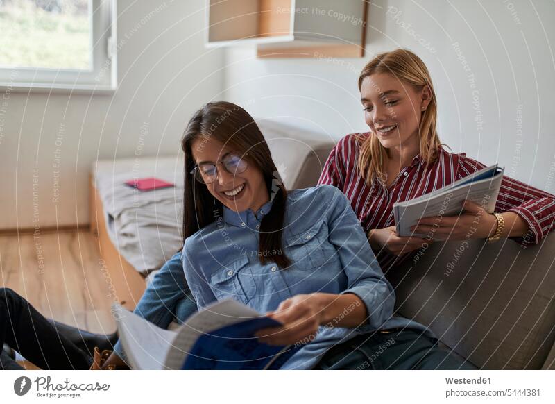 Happy students in dormitory learning together happiness happy student accommodation dorms student dorm dormitories student dorms female students education