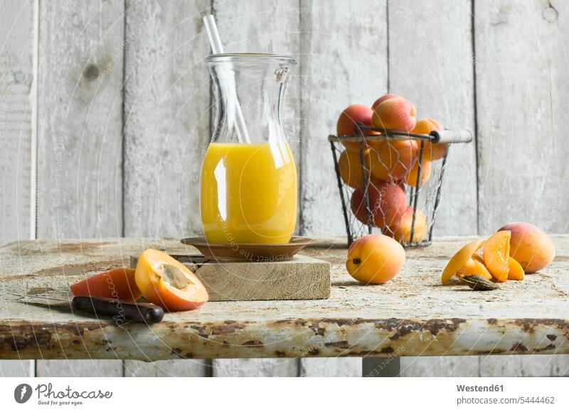 Apricot smoothie in carafe food and drink Nutrition Alimentation Food and Drinks wire basket Juice Juices apricot smoothie Orange Citrus sinensis Oranges