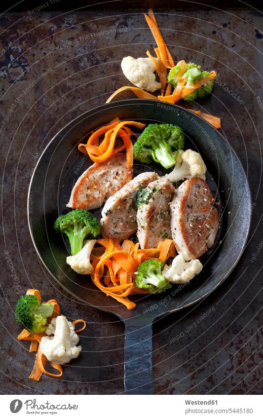 Fillet of turkey and vegetables in pan food and drink Nutrition Alimentation Food and Drinks Cauliflower Cauliflowers piece pieces chunks part parts cut Carrot