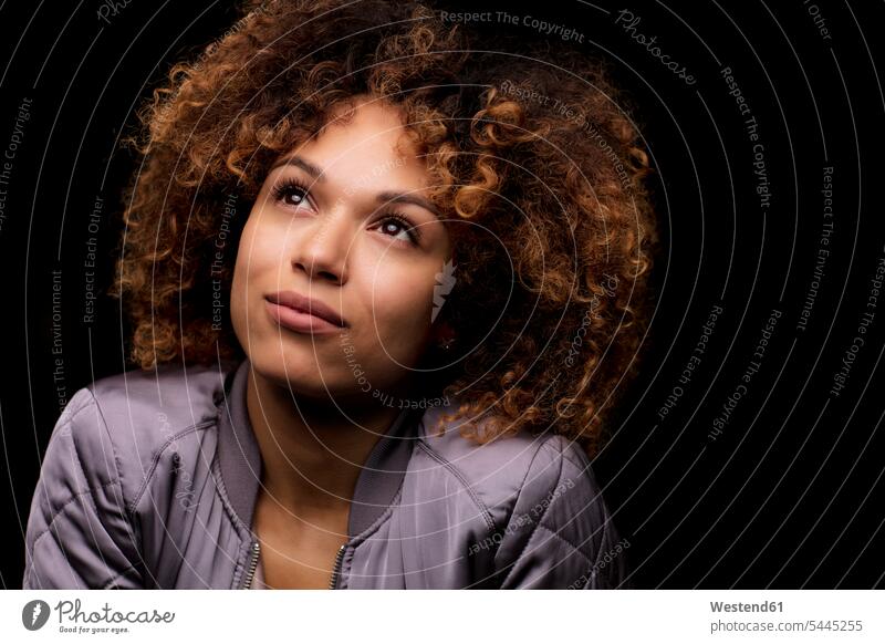Portrait of woman in front of black background portrait portraits females women Adults grown-ups grownups adult people persons human being humans human beings