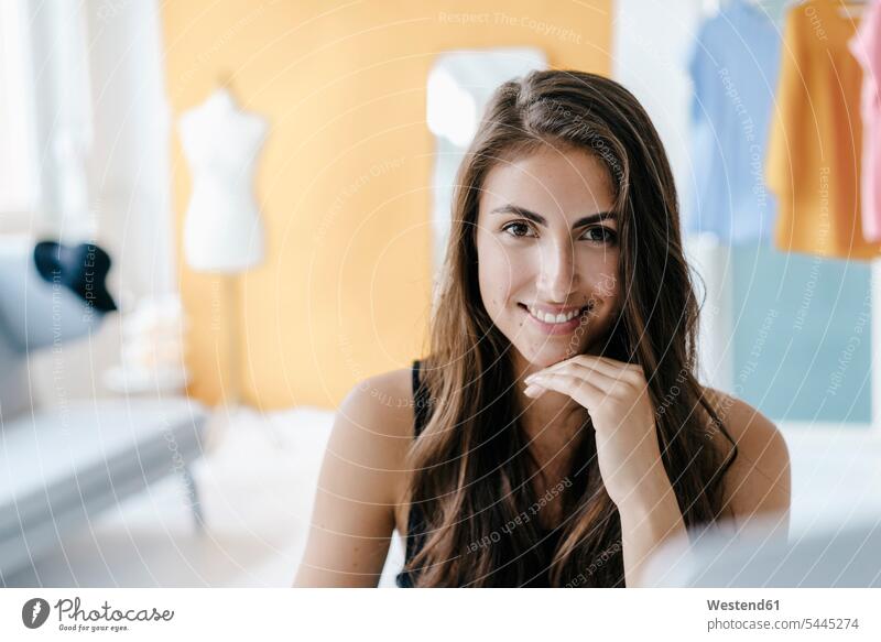 Beautiful Brown-haired Young Woman Wearing Clothes Stock Photo